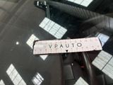 a close up of a sticker on the windshield of a car