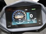 a digital display on the dashboard of a motorcycle