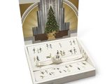 une carte de Noël avec une photo d'un sapin de Noël en arrière-plan
