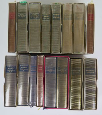 a lot of books that are sitting on a table