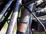 a close up of a motorcycle with a lot of rust on it