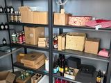 a room with a lot of boxes and boxes on the shelves
