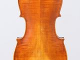 an old violin with a wooden back and a long neck