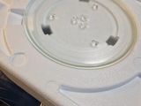 a white box with a plastic lid sitting on top of a table