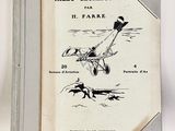 un vieux livre avec l'image d'un oiseau volant dans les airs