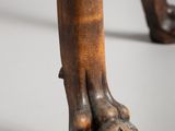 an image of a close up of the legs of a wooden table