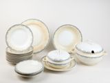 an image of a group of plates and bowls sitting on a table