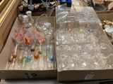 many empty glasses in the box on the table