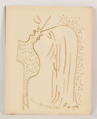 an old book with a drawing of a woman ' s face on it