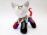 a small figurine of a cat wearing a shirt and tie