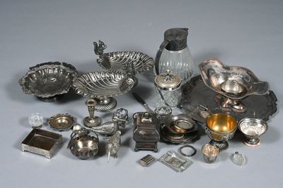 a lot of silver items that are on the table