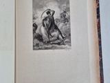 an old book with a drawing of a man on a horse