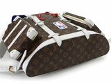 a brown and white louis vuitton bag on a white surface