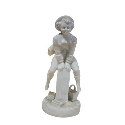 statue of a woman with a basket of flowers on a pedestal