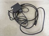 a black cord that is connected to a charger