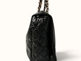 chanel black quilted leather handbag with gold chain strap