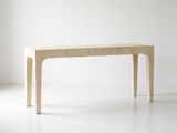a wooden table with two drawers on top of it