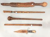 five different types of wooden tools on a white surface