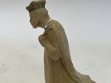 statue of a woman praying on a white background