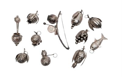 a lot of silver items that are on a white surface