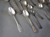 a lot of spoons and spoon spoons on the table