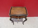 an image of a small table on a tile floor