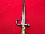 a picture of a knife on a red cloth