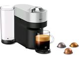gros plan d'une cafetière avec une tasse de café