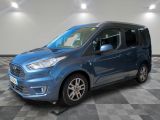 a blue ford transit van parked on a checkered floor
