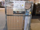a metal cage with a sign on it in a warehouse