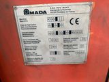 an image of a sign on the side of a red machine