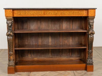 an antique wooden bookcase with carvings and a marble top