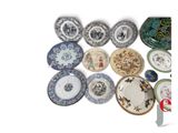 a lot of plates that are sitting on a table