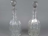 pair of cut glass decanters with stoppers on each side
