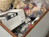 a box full of stuffed animals and other items in it