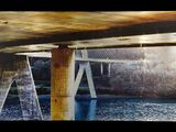 a picture of a bridge over a body of water