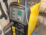 an image of a welding machine in a garage