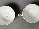 pair of chinese porcelain cups and saucers with floral decoration