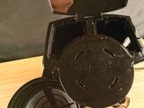 a coffee grinder sitting on top of a wooden table