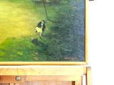 a painting of a man and a dog on a painting easel