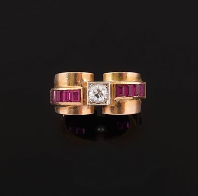 une bague sertie de diamants et de rubis
