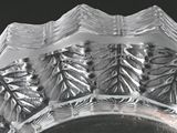 a close up of a glass bowl with a decorative design