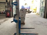 an image of a dolly truck in a garage