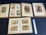 several old photos of people are displayed in a book