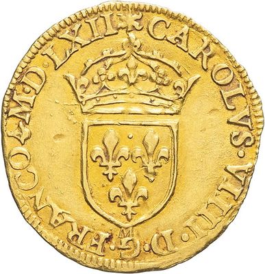a gold coin with a crown on top of it