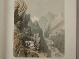 a picture of a book with a picture of a mountain scene