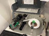 a computer and a keyboard on a desk in a room