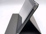 a tablet that is sitting on top of a stand