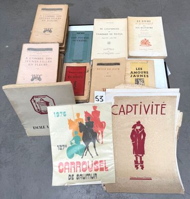many books that are sitting on top of a table