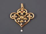 un pendentif ancien en or et diamants
